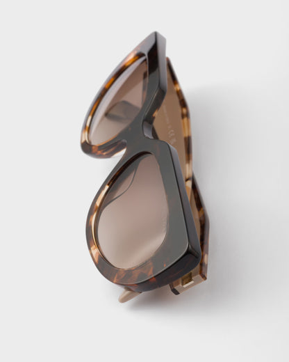 Ovale Sonnenbrille mit Logo und kaffeefarbenen Gläsern
