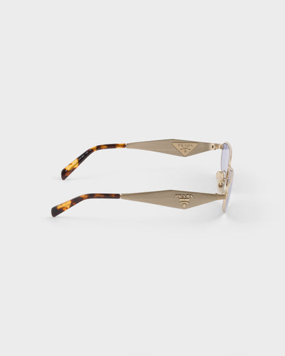 Pale gold acetate oval sunglasses with ultraviolet lenses