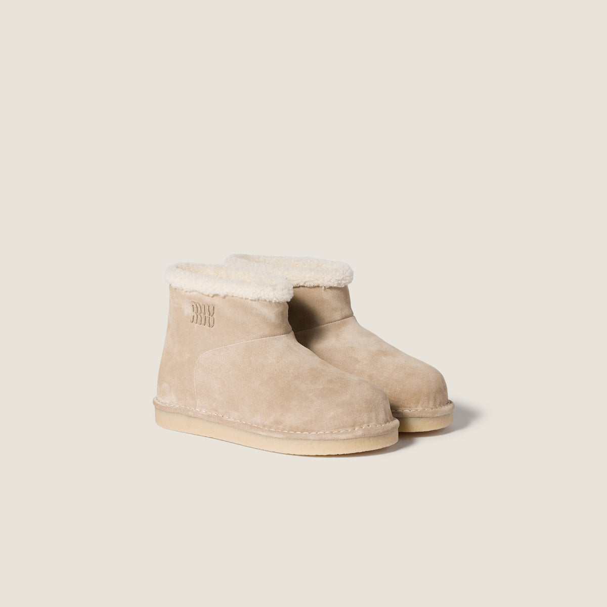 Stiefeletten aus Wildleder und Lammfell in Beige