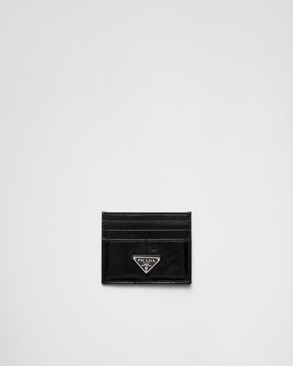 Black leather card holder with triangular logo