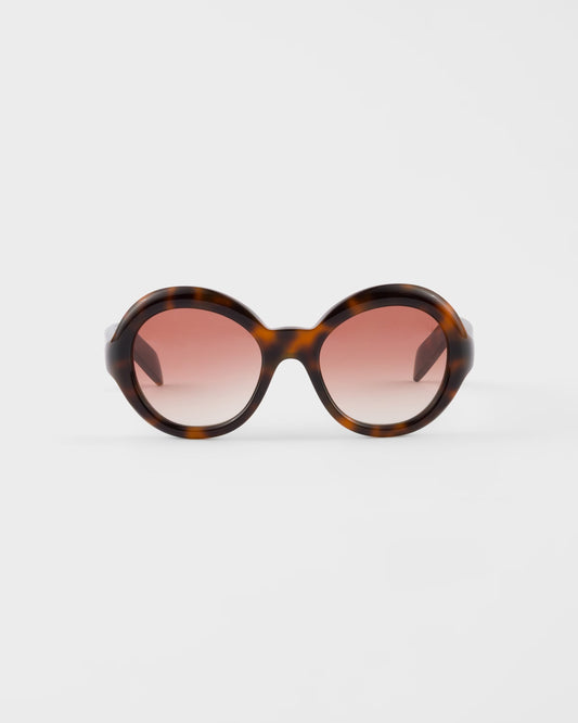 Round sunglasses with powder pink gradient lenses