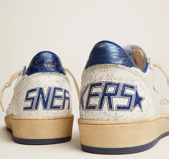 White nappa leather with star and cornflower blue heel