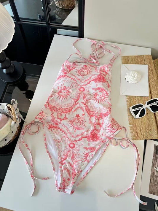 Badeanzug mit Sonnenmotiv Himmelblau und Rosa