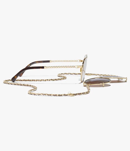 Pilot-Sonnenbrille aus hellgoldfarbenem Metall und Kalbsleder mit braunen Gläsern