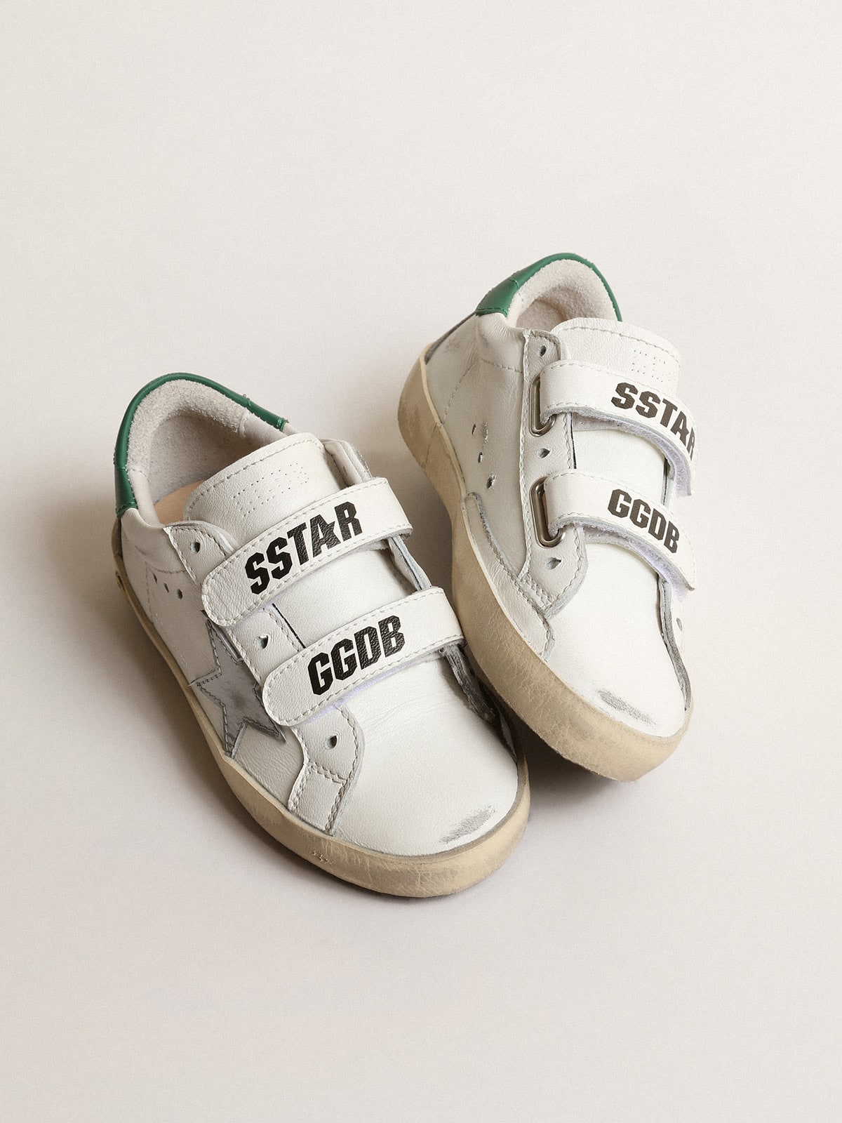 Old School Young with metallic leather star and green heel