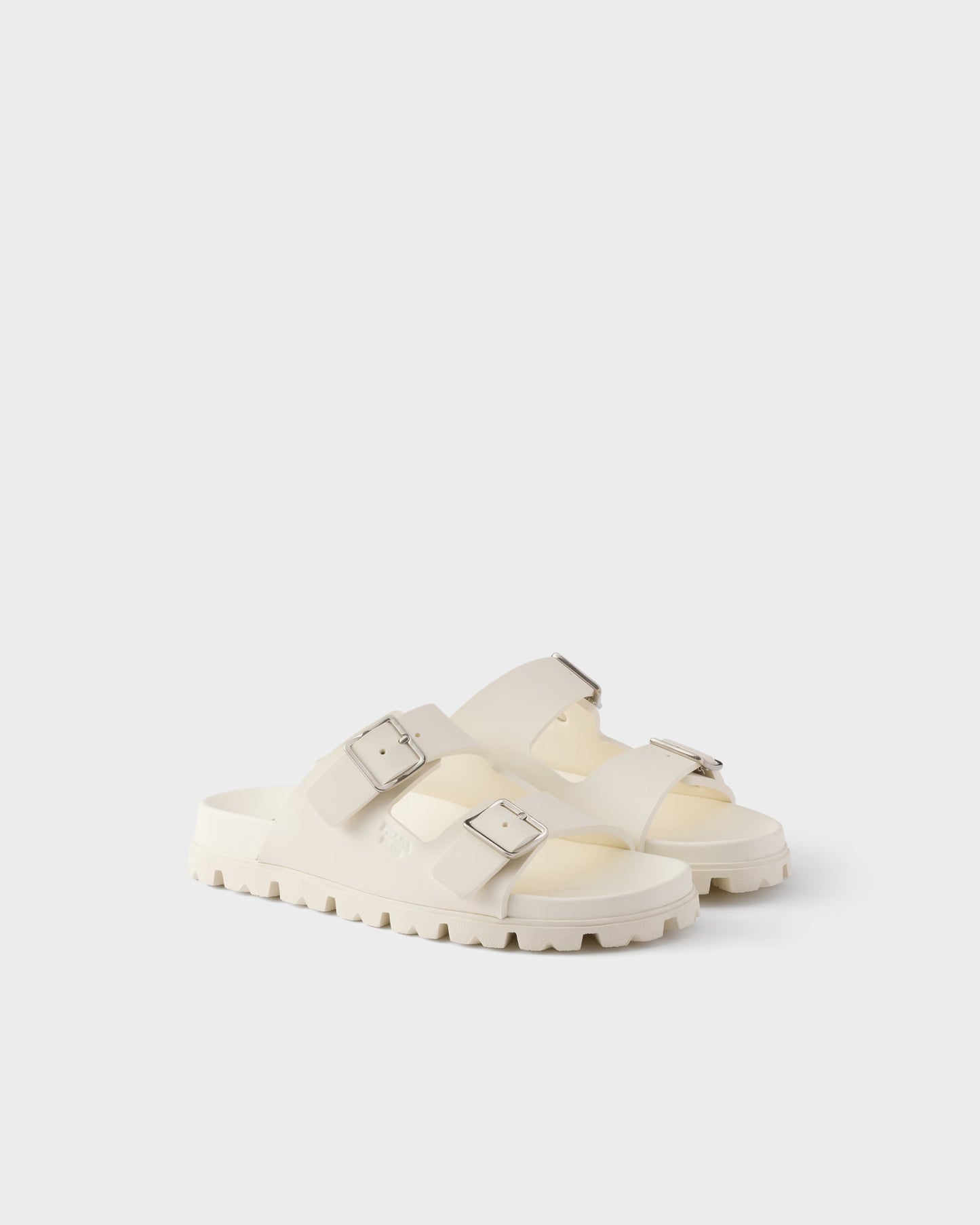 Slider-Sandalen aus elfenbeinfarbenem Gummi