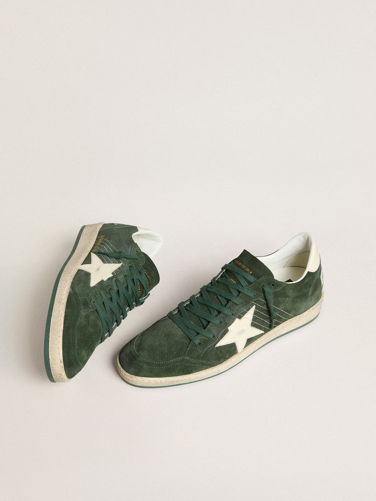Green suede with star and white leather heel