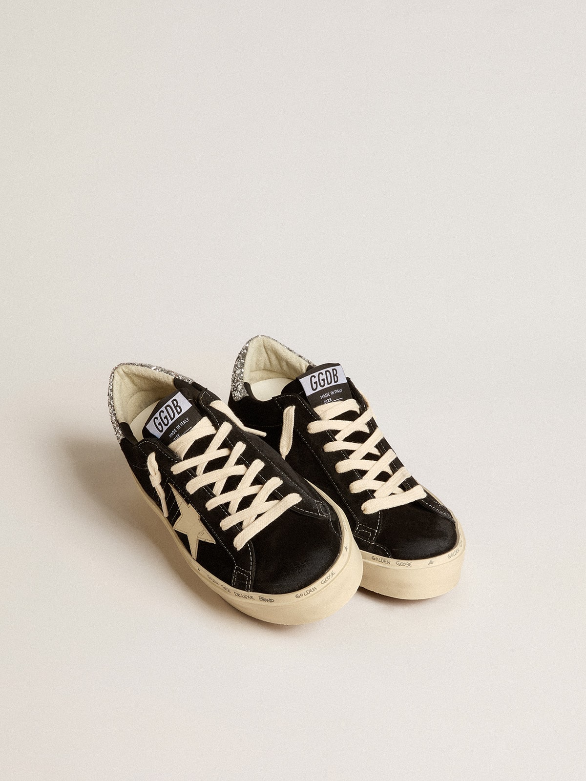 Hi Star shoes in black leather with silver glitter on the heel.