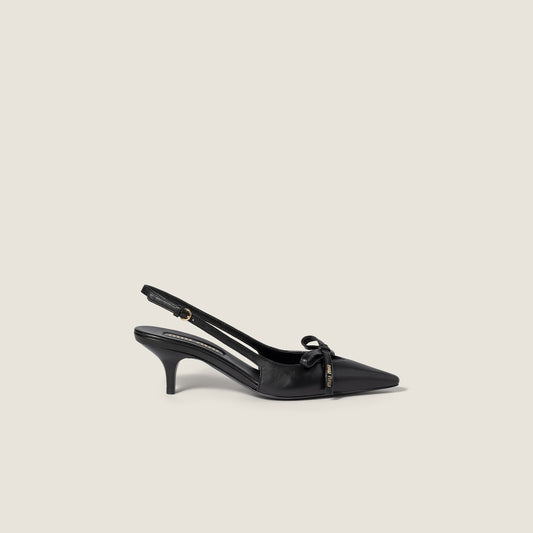 Leather slingback pumps with a black bow