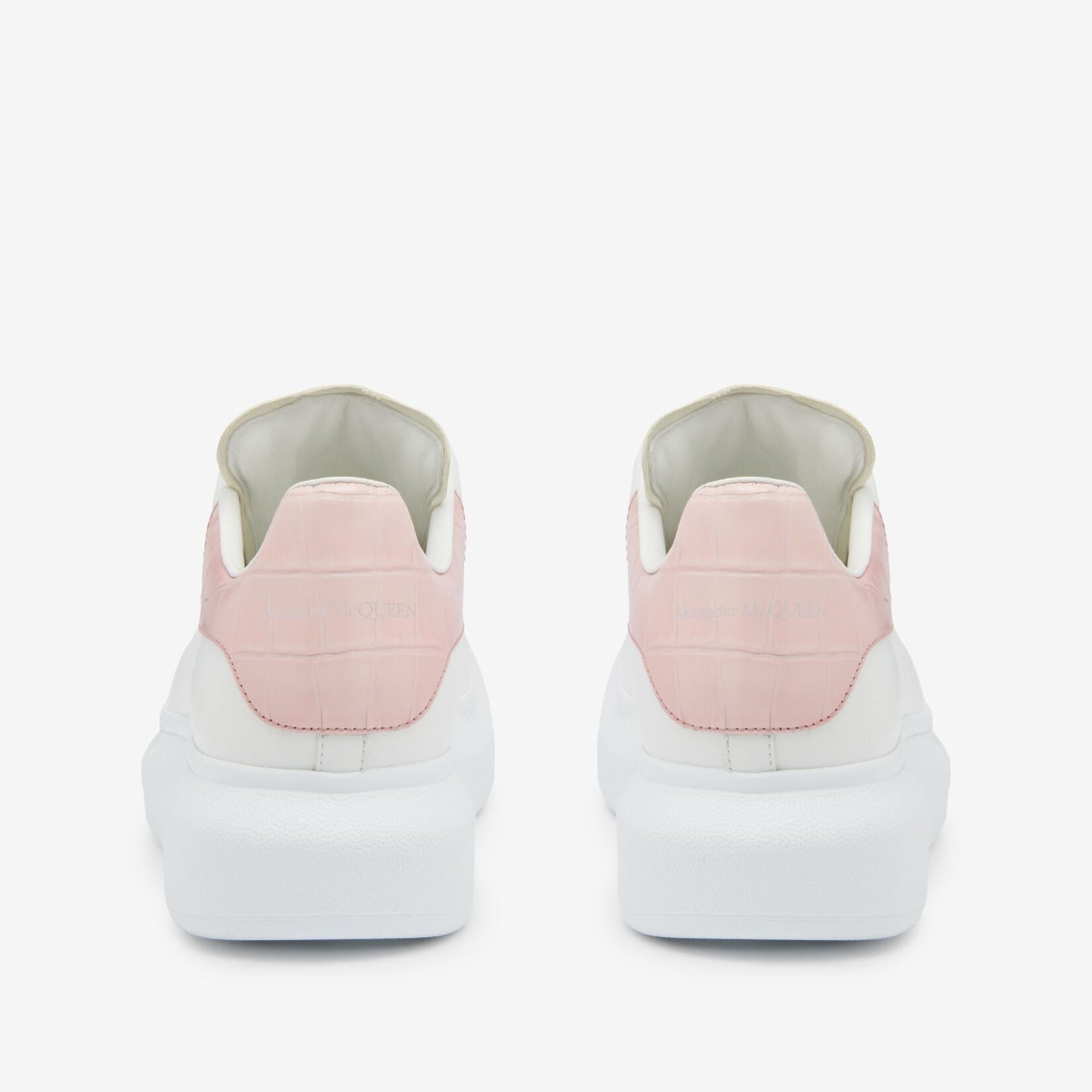 Oversized sneakers in pink and white crocodile