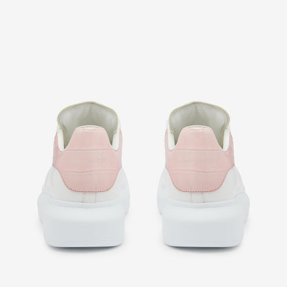 Oversized sneakers in pink and white crocodile