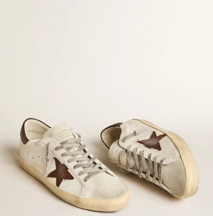 Super-Star made of bio-based material with canvas star and dark brown leather on the heel