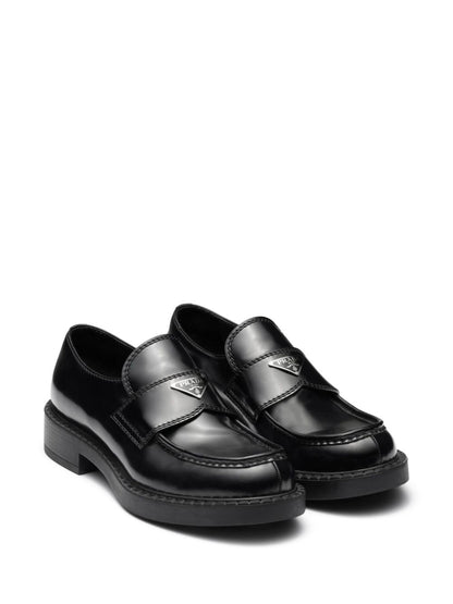 Brushed leather slippers in black