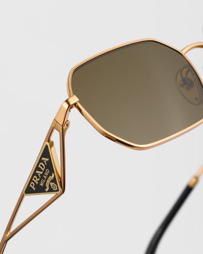 Sunglasses with triangle logo and moss green lenses