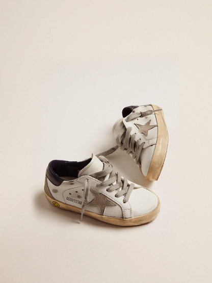Young superstar with suede star