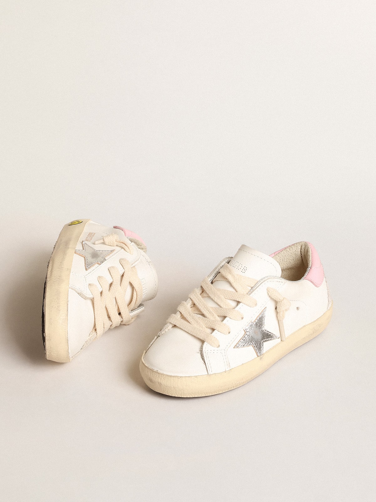 Super-Star Young with silver leather star and pink heel
