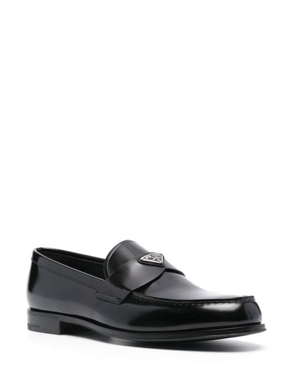 Leather moccasins with enameled triangle logo