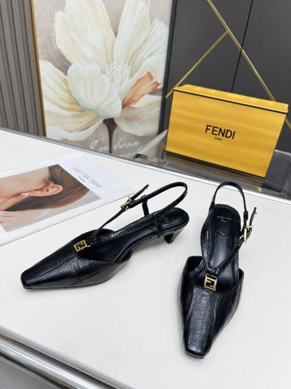 Black leather kitten-heel pumps with gold FF buckles