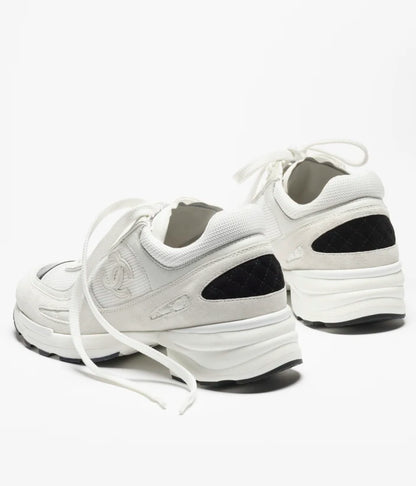 Sneaker aus Mischgewebe und Wildleder in Weiß/Schwarz