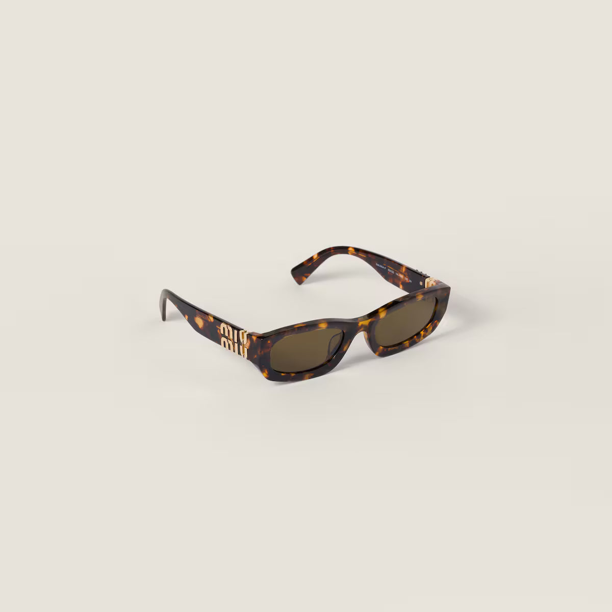 Miu Glimpse Sonnenbrille mit flacher Form Rahmen in Honig-Schildpatt Gläser in Loden-Grün