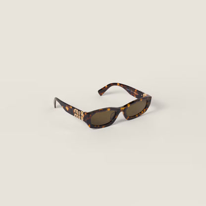 Miu Glimpse Sonnenbrille mit flacher Form Rahmen in Honig-Schildpatt Gläser in Loden-Grün