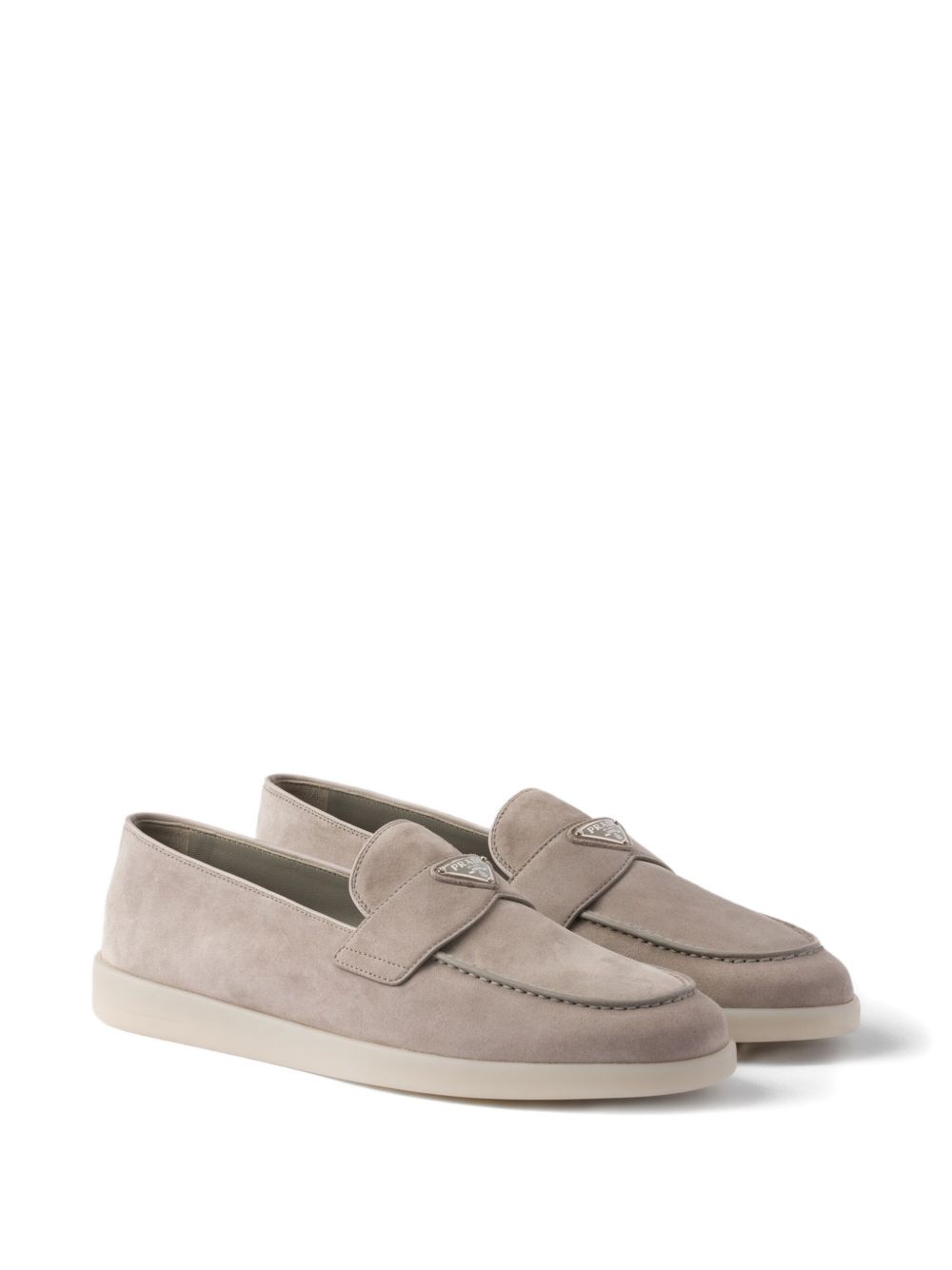 Beige suede slipper with triangle logo
