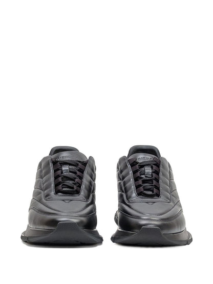 Sneakers aus schwarzem Leder mit Steppmotiv