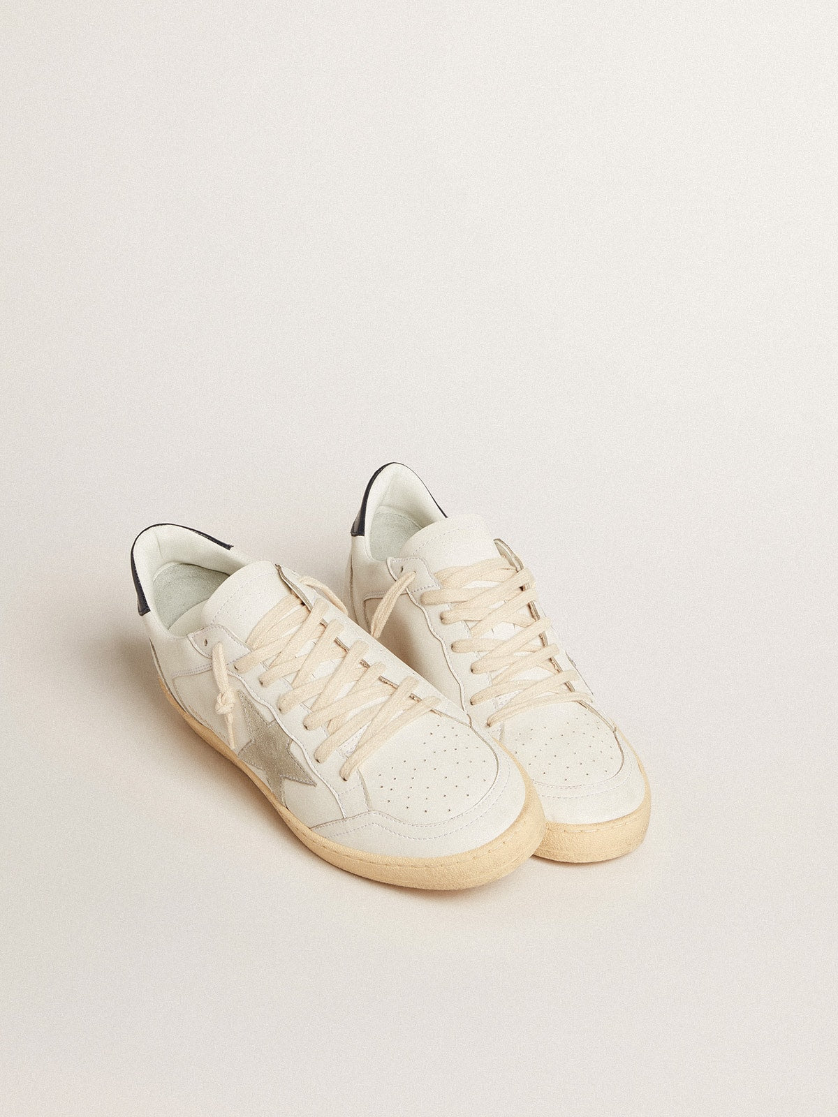 Suede star and blue leather on the heel