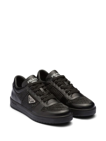 Black leather sneakers with crystal details