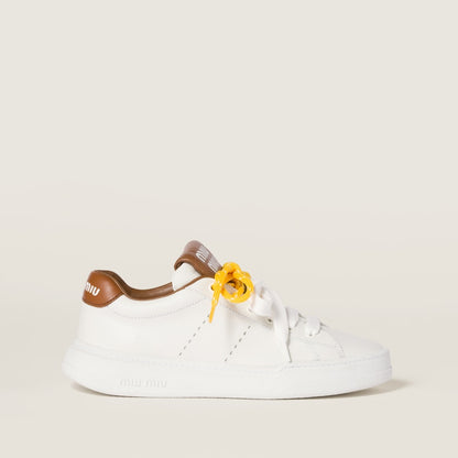Sneakers aus Leder in Weiß/Braun