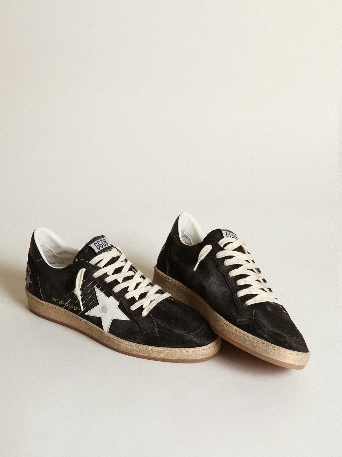 Black suede with white leather star