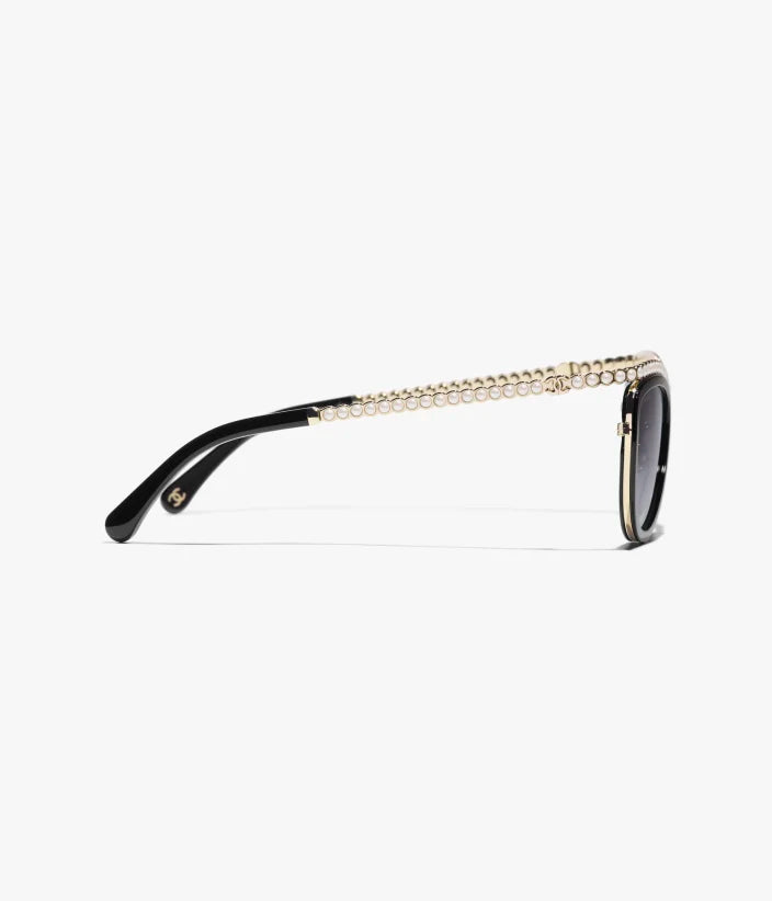 Cat-Eye-Sonnenbrille aus Acetat mit schwarzen und grauen Gläsern sowie Kunstperlen