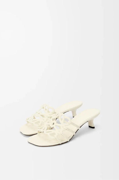 Slide Anagram Petal with heel in soft white leather