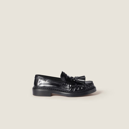 Black brushed leather loafers with tassels