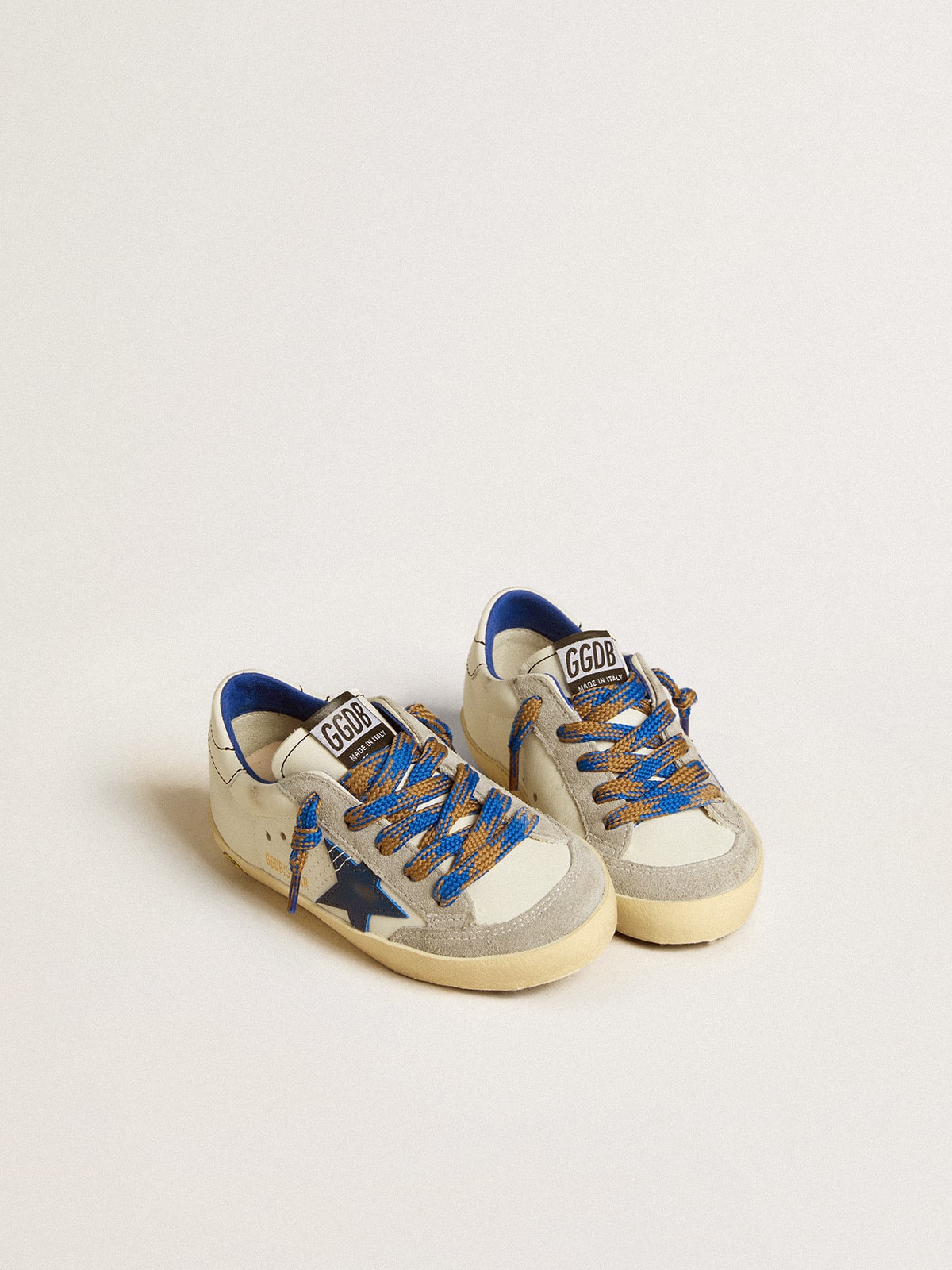 Super-Star Young with blue leather star and ice-grey suede inserts