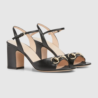 Women's black leather heeled sandals with Morsetto detail