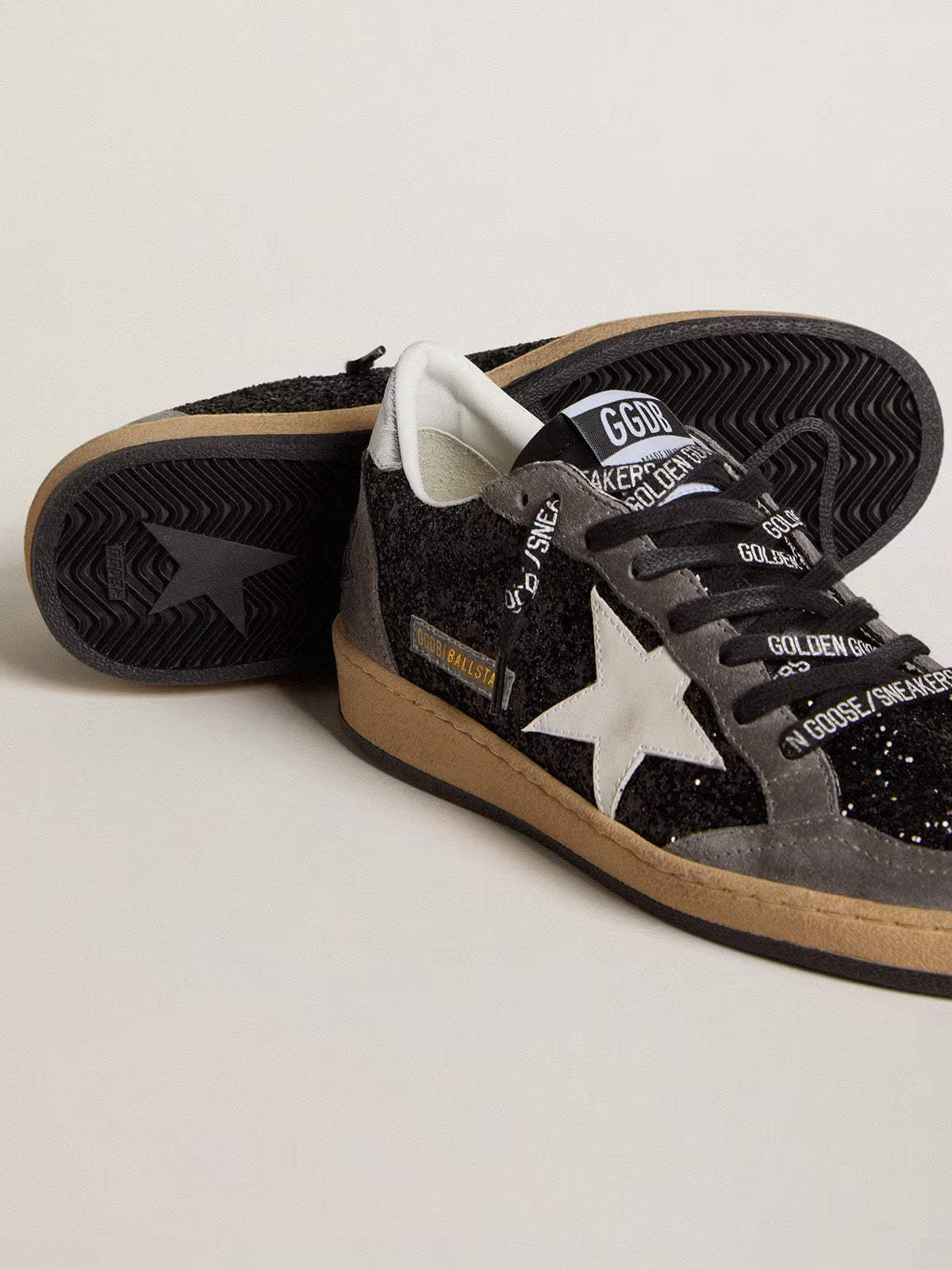 Glitter with leather star and metallic leather on the heel