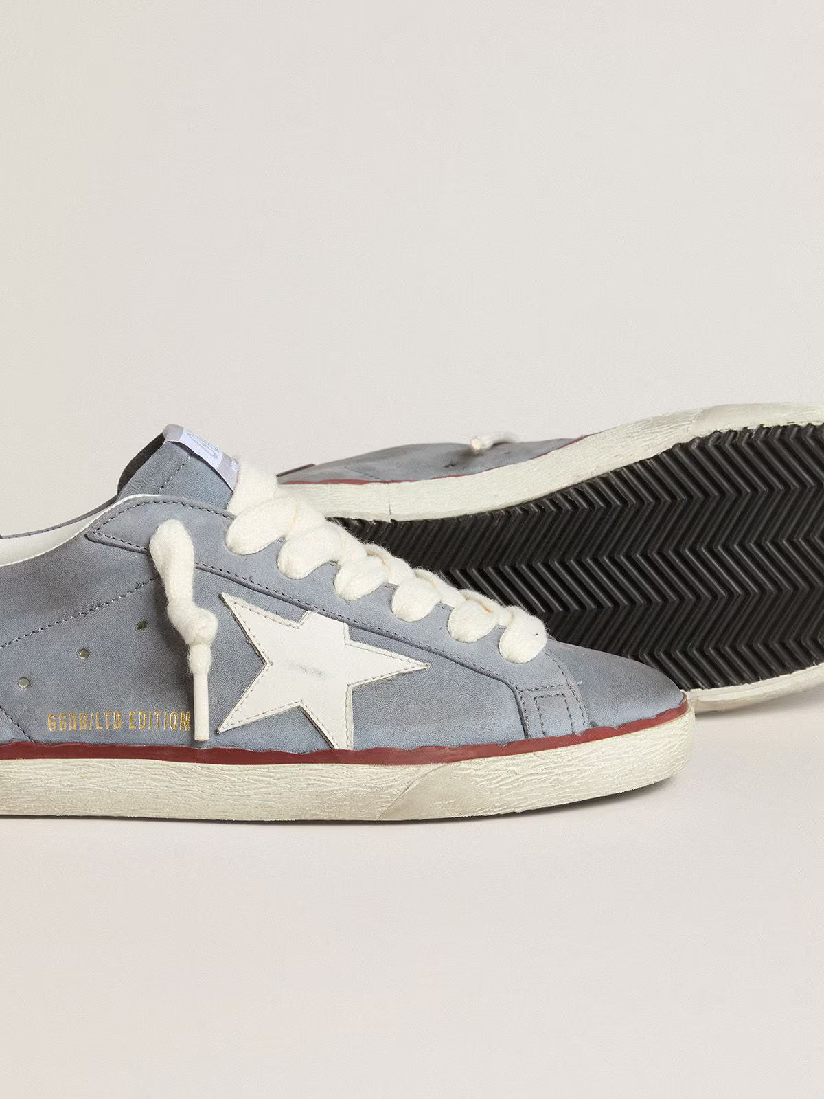 LTD in azure nubuck with white leather star and brown leather at the heel
