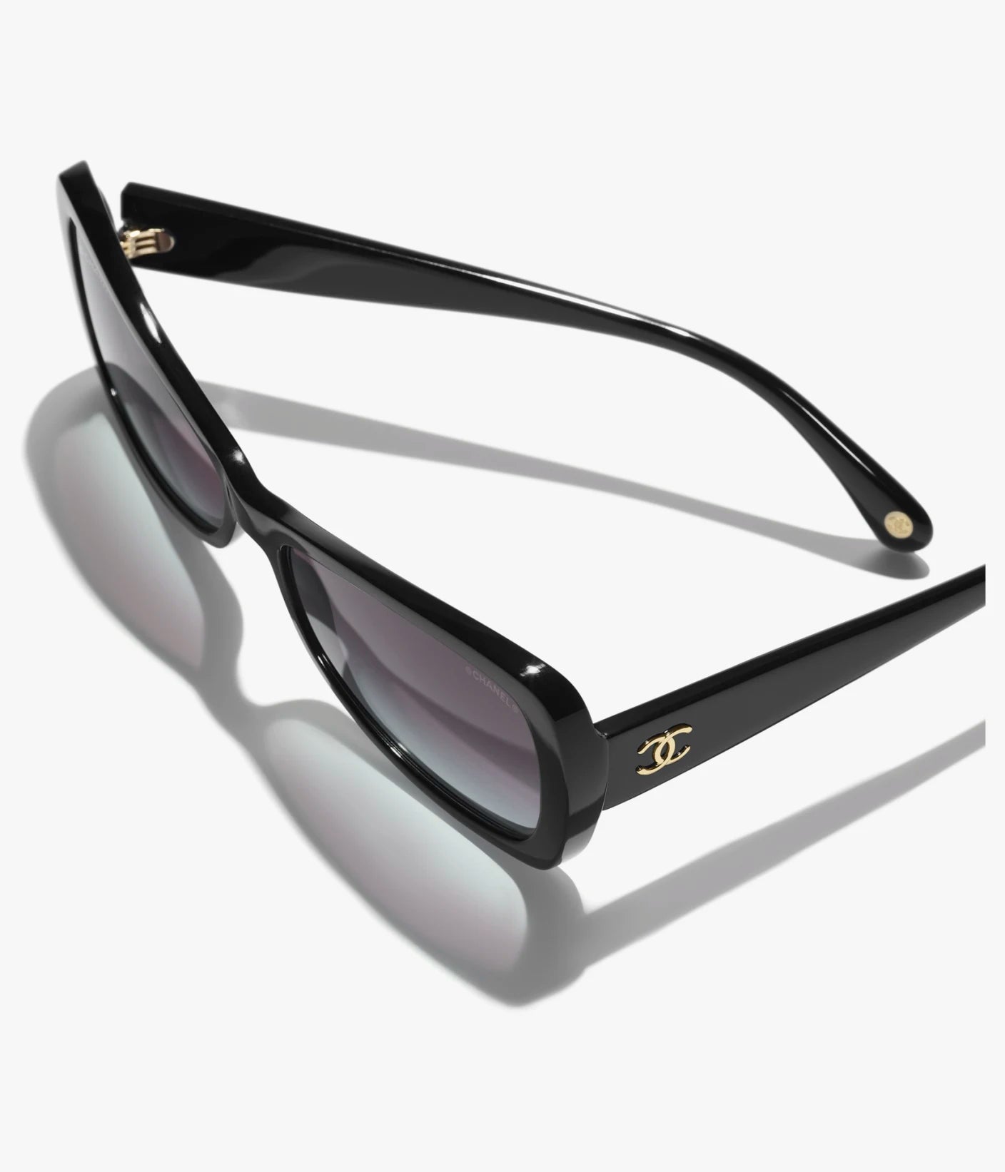 Butterfly-Sonnenbrille aus schwarzem Acetat mit grau verlaufenden Gläsern