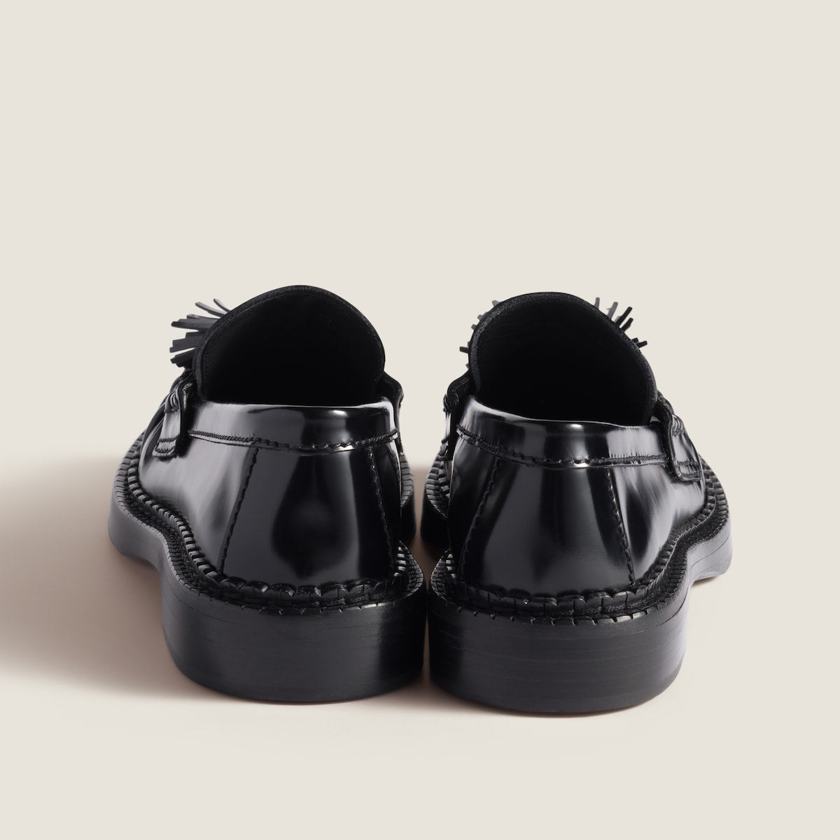 Black brushed leather loafers with tassels