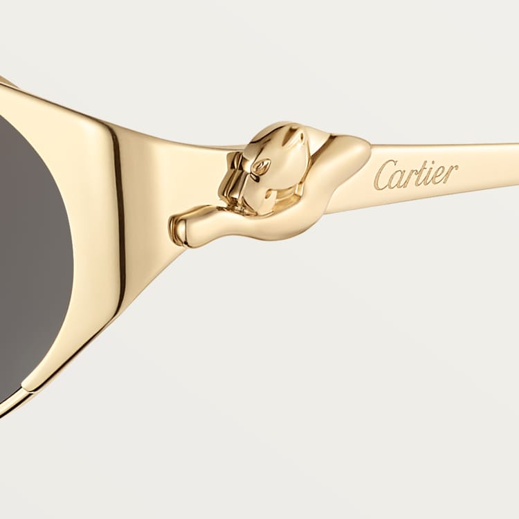 Oval women's Panthère de CT sunglasses with grey lenses and gold-tone details