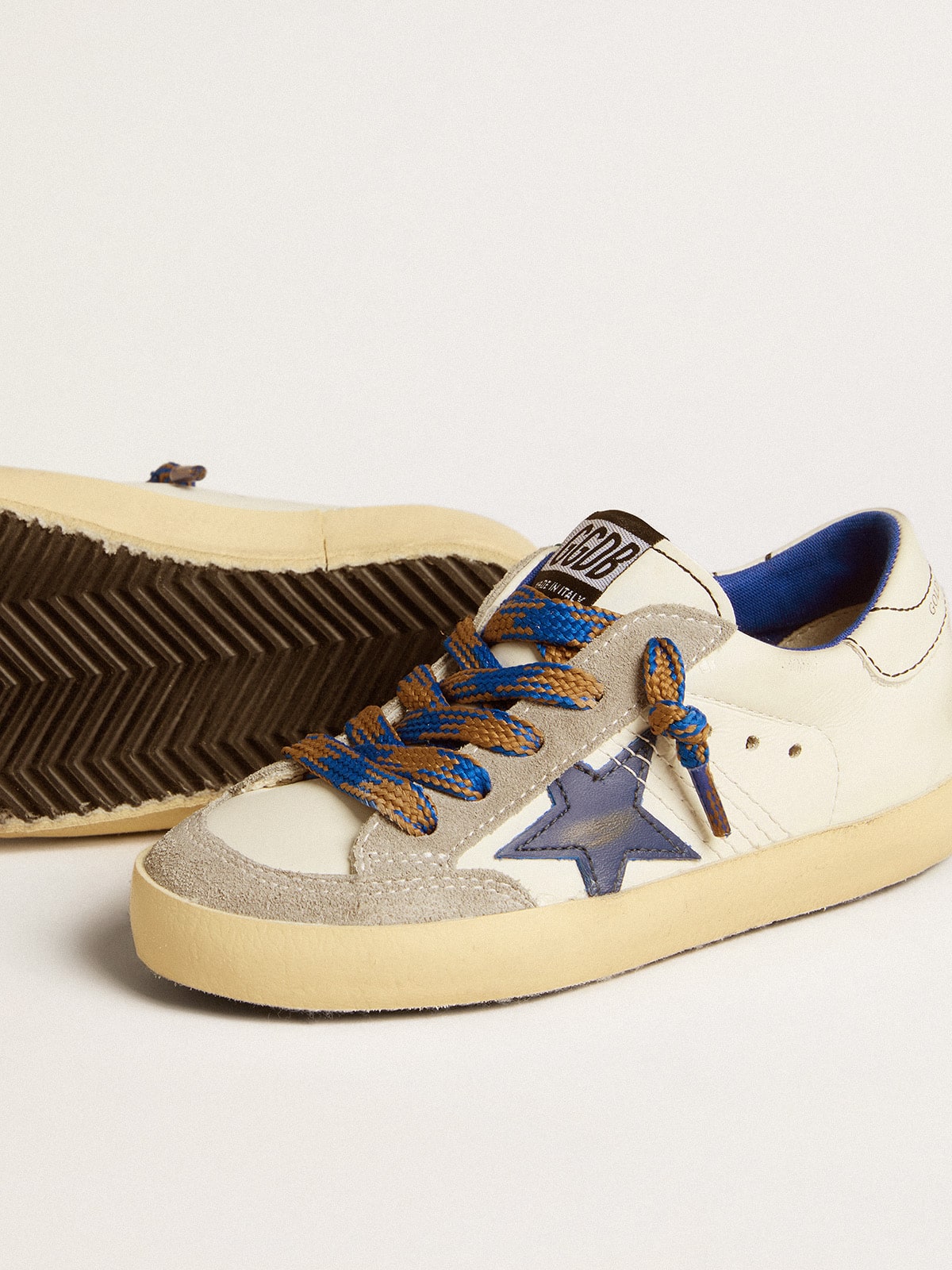 Super-Star Young with blue leather star and ice-grey suede inserts
