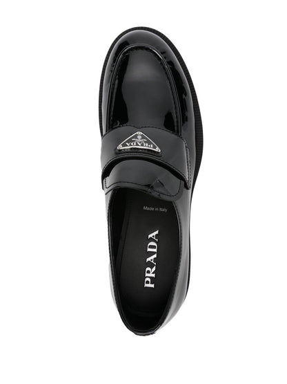 Black leather slipper with triangle logo