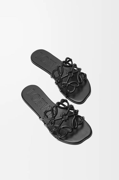 Slide Anagram Petal made of soft leather Black