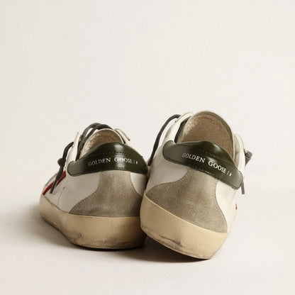 Red suede star and green leather on the heel