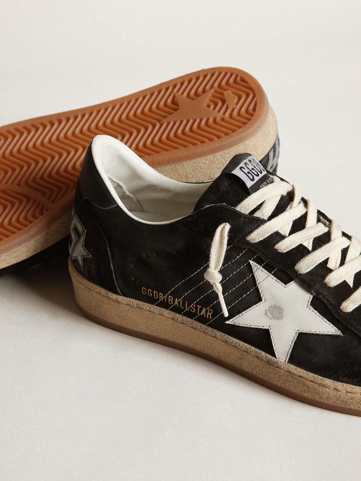 Black suede with white leather star