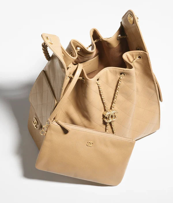 CHANEL 25 Mittelgroße Tasche Dunkelbeige