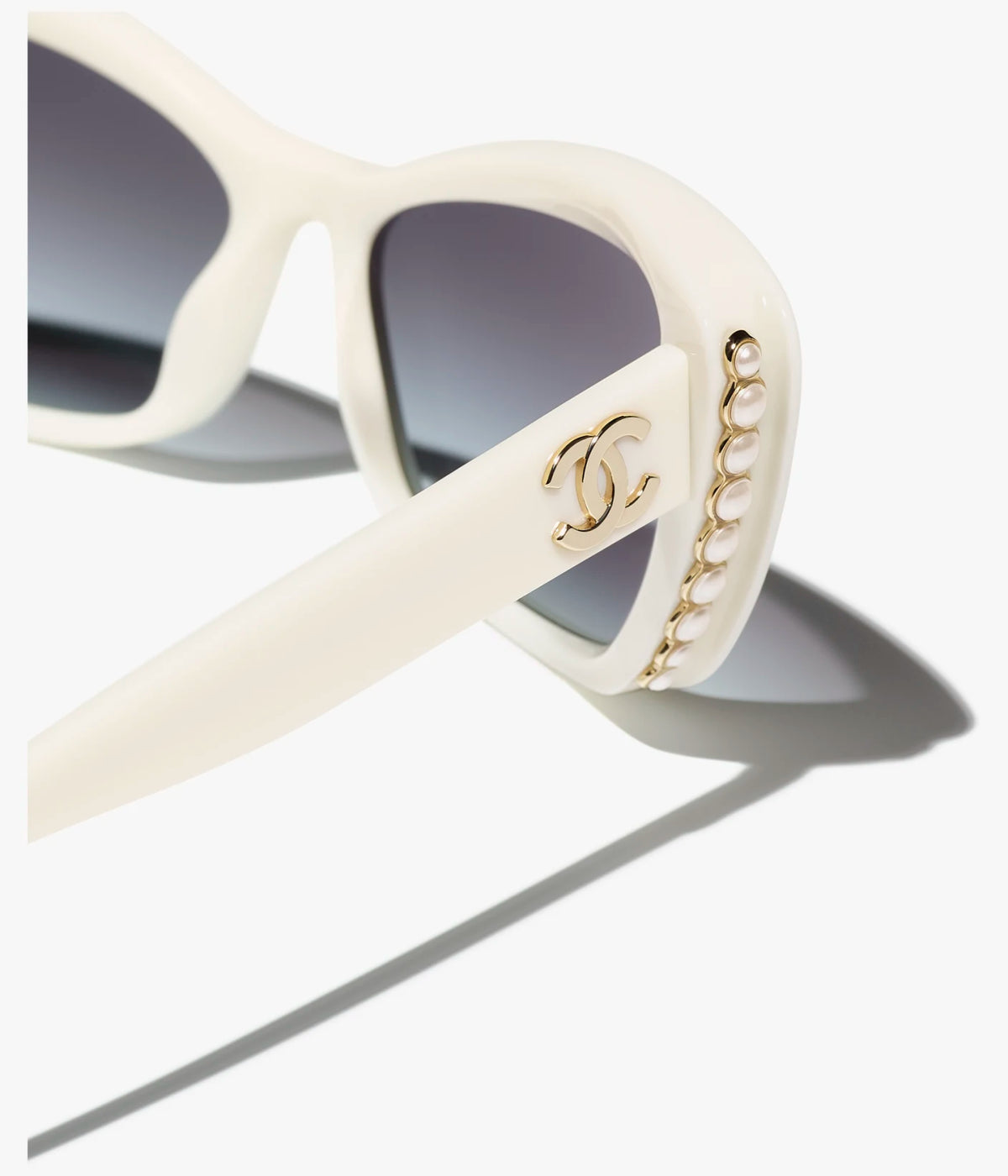 Cat-Eye-Sonnenbrille aus Acetat und weißem Perlmuttglas mit grau verlaufenden Gläsern