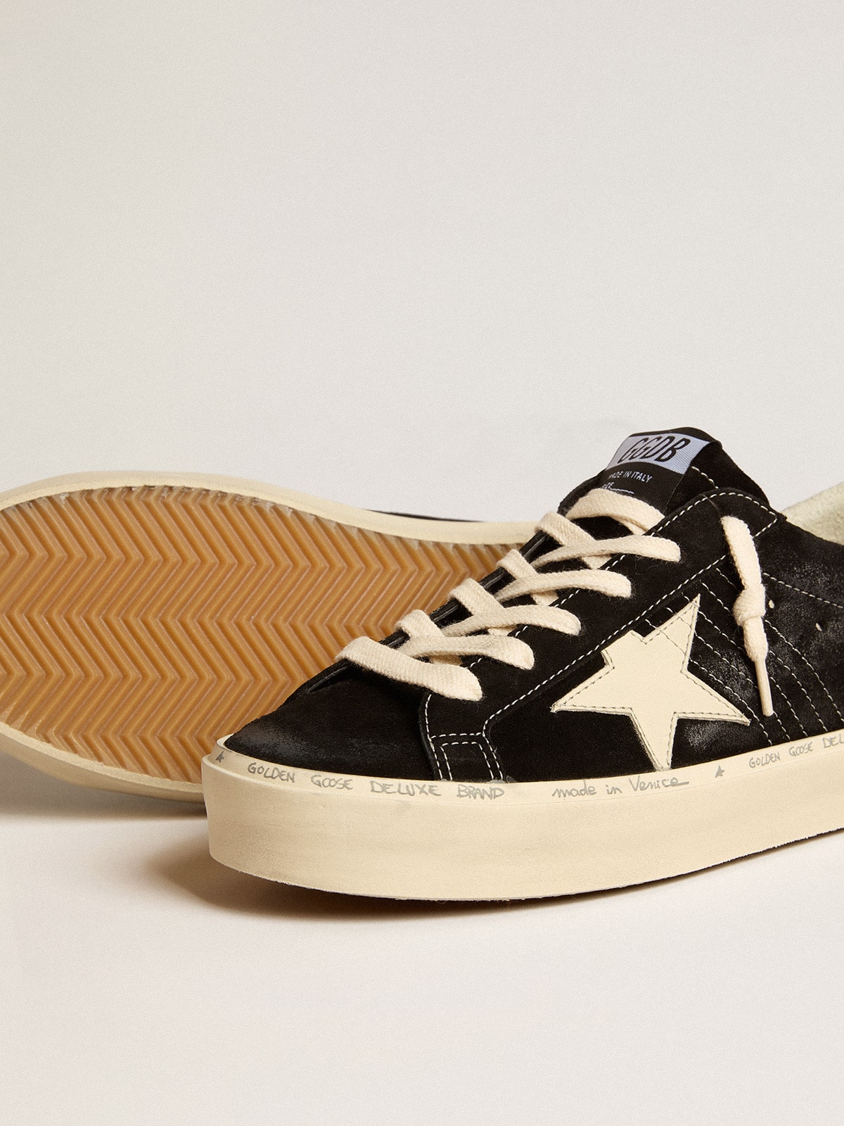 Hi Star shoes in black leather with silver glitter on the heel.