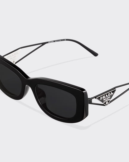 Sunglasses with triangle logo and slate-colored lenses